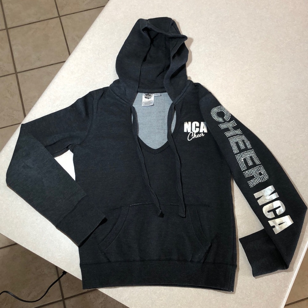 Charcoal grey NCA v-neck fleece hoodie.